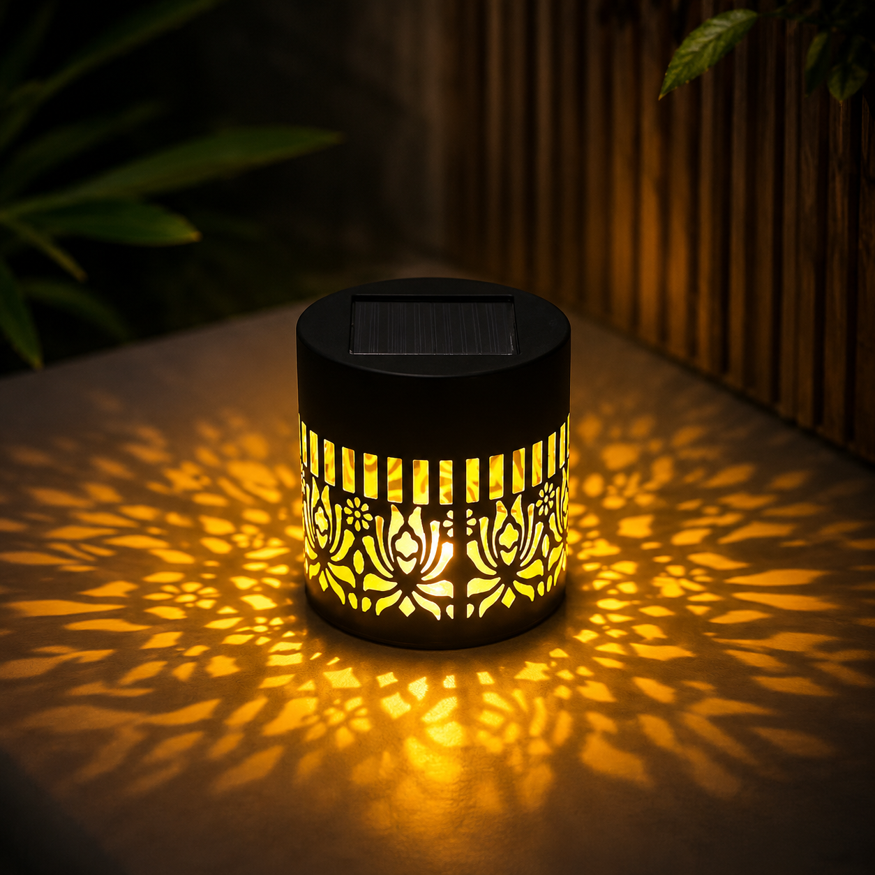 Cozy Garden solar light glowing with elegant shadow patterns in a garden